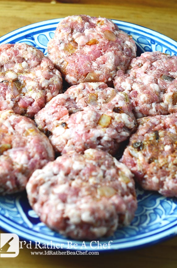 The perfect pork burgers recipe with bacon, onions, roasted garlic and spices to punch up the flavor!