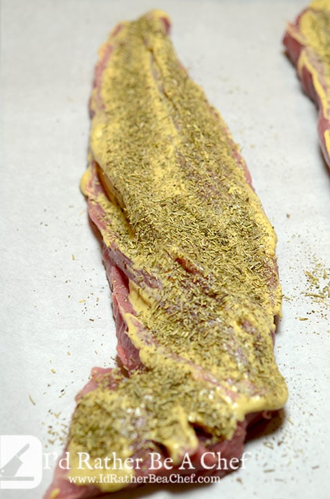 Covering the baked pork tenderloin recipe in dijon and herbs makes for a flavorful crust!