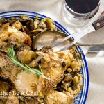 A country style slow cooker coq au vin recipe made with crisp French chardonnay, onions, mushrooms and garlic. So good you'll make this again and again.