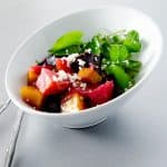 A perfectly balanced roasted beet salad with goat cheese, shallots, classic dijon vinaigrette and crisp watercress.