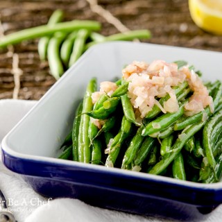 This easy haricot vert recipe builds incredible flavor with butter, shallots, lemon juice and a pinch of salt. Ready in under 10 minutes as a delicious vegetable side dish!
