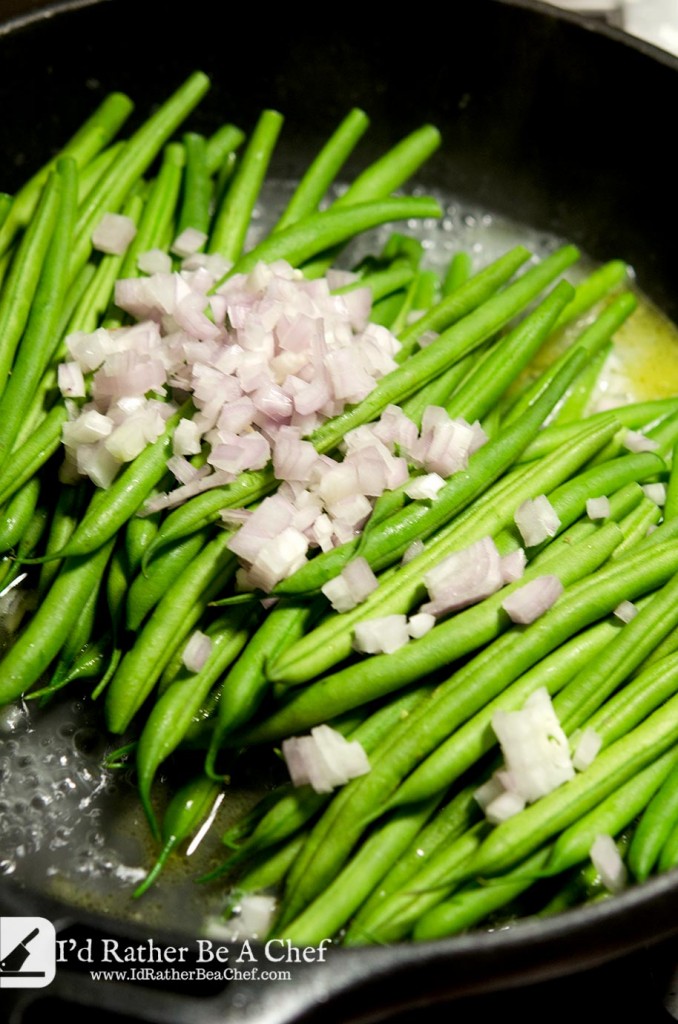 For this haricot vert recipe, we are going to use one pan and add all of our ingredients in at one time. The butter, lemon juice, shallots and green beans love to cook together.