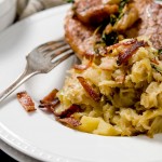 A wonderful sauteed cabbage side dish with bacon, onions and apples. Perfect pairing with a thick cut pork chop.
