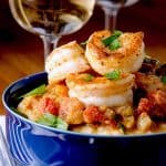 The perfect spicy shrimp creole recipe served over polenta with plenty of sass to go around!