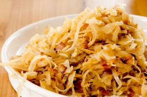 A super easy sauerkraut recipe, brought together with duck fat, bacon and onions. Semi-homemade too!