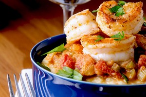 The perfect spicy shrimp creole recipe served over polenta with plenty of sass to go around!