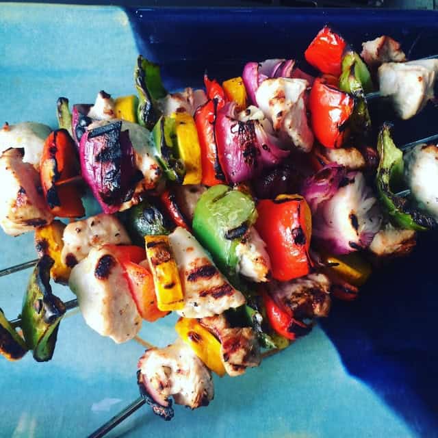 4 chicken and veggie kebabs on skewers