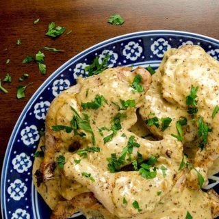 Oven baked chicken legs are tender, delicious and incredibly easy to make. Don't forget the mustard cream sauce too- it's outstanding!