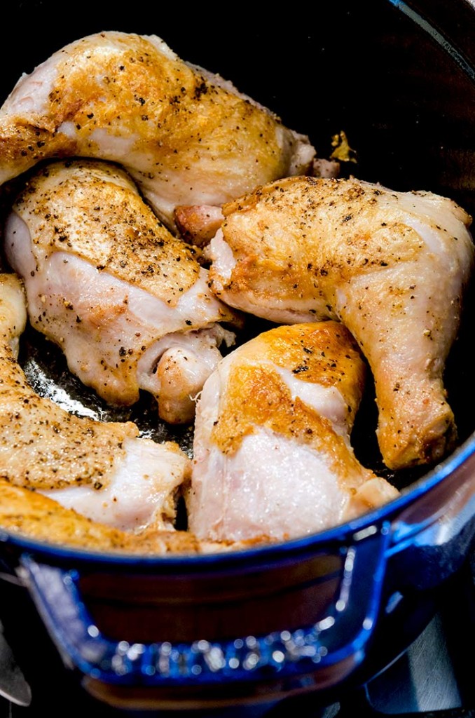 To make oven baked chicken legs more flavorful, make sure that they are browned in the pan first, then cooked off in the oven.