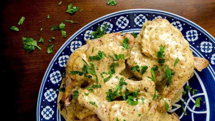 Oven baked chicken legs are tender, delicious and incredibly easy to make. Don't forget the mustard cream sauce too- it's outstanding!