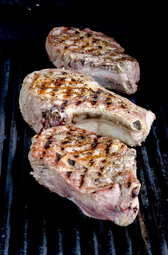 Grilling pork chops takes a little time and patience, but when done right they will turn out perfectly.