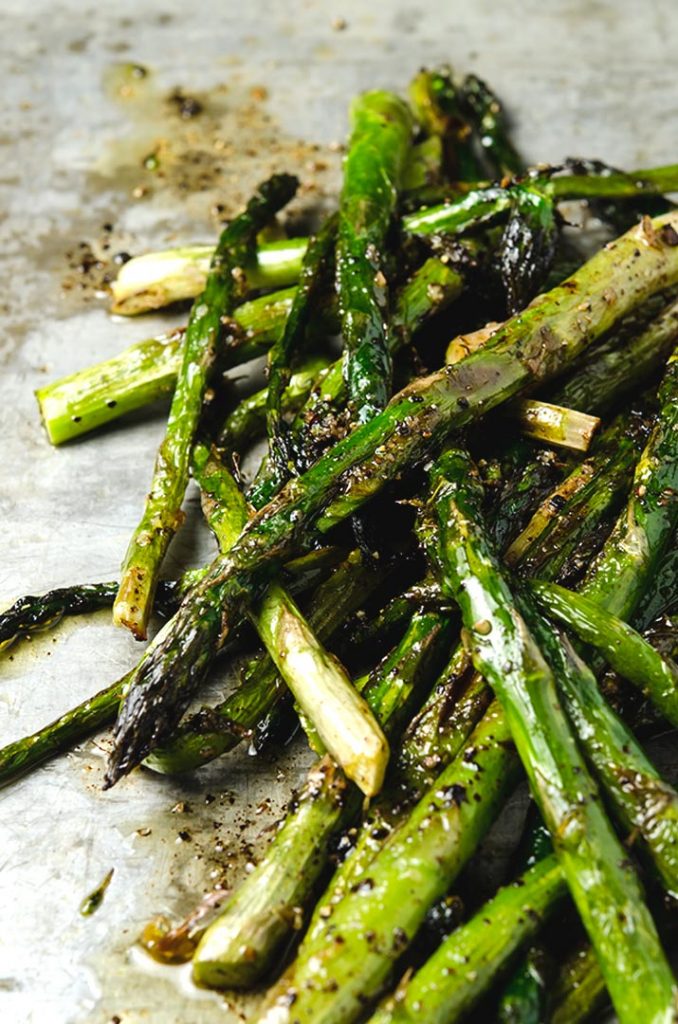 Roasting asparagus with brown butter and balsamic intensifies the flavors to mythical proportions.