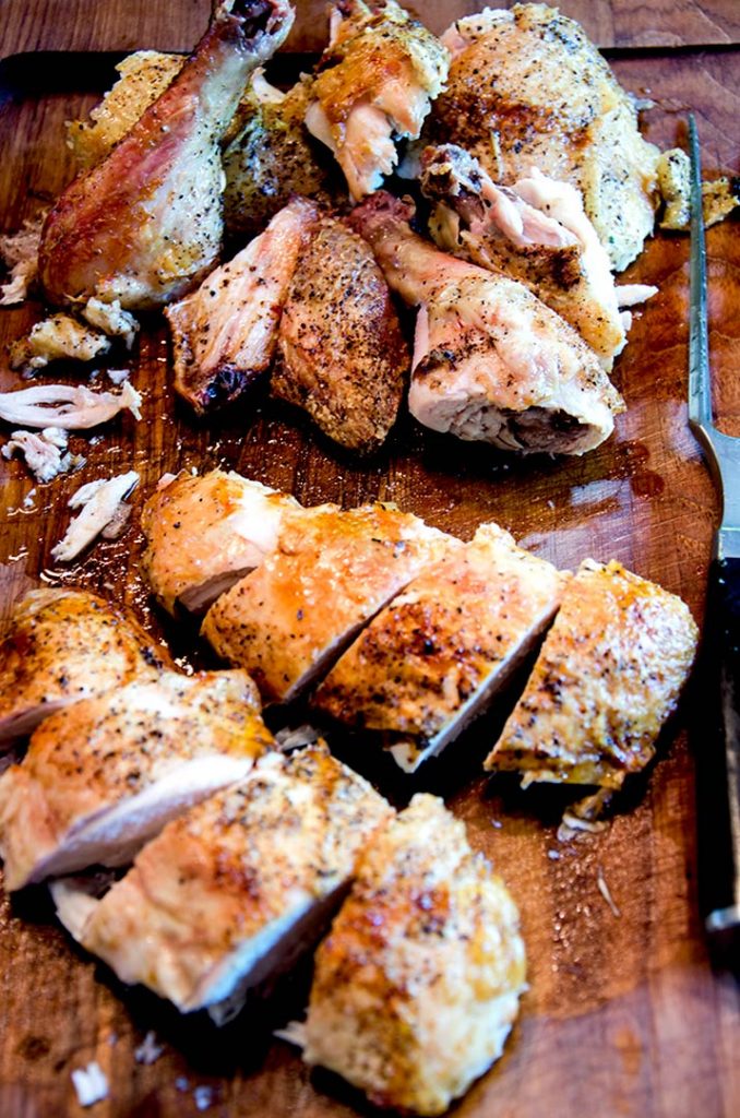 After your beer can chicken has been cooked on the grill, it's time to slice and dice. Enjoy!