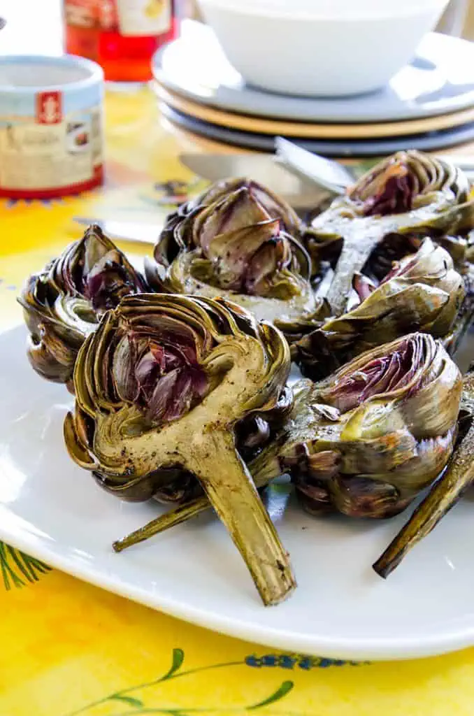 At our table a plate of grilled artichokes means a happy family. Everyone loves these.