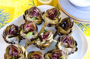 Delicious grilled artichokes have a delicate flavor, tender heart and provide a wonderful eating experience. Learn how to grill artichokes today!