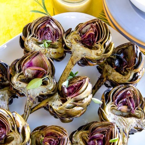 Delicious grilled artichokes have a delicate flavor, tender heart and provide a wonderful eating experience. Learn how to grill artichokes today!