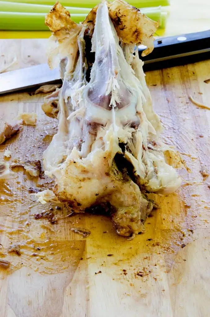 Rotisserie chicken salad starts off by removing all the chicken from the bird. This is fun and tasty (you get to eat all the parts that don't work in the salad!).