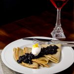 blueberry compote sauce applied onto gluten free crepes