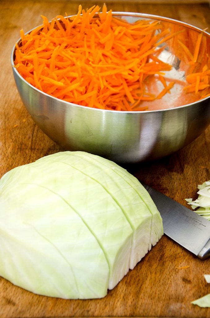 This coleslaw recipe doesn't need a food processor. Learn how to cut cabbage easily for coleslaw by hand!