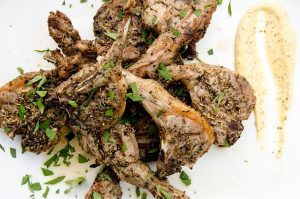 Grilling lamb chops is easy, fast and results in a delicious meal. Serve with spicy mustard for the perfect pairing.