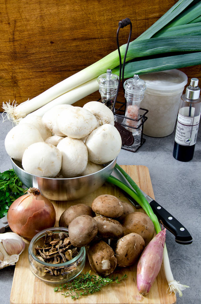 Gather up all the fresh ingredients you will need for this satisfying cream of mushroom soup.