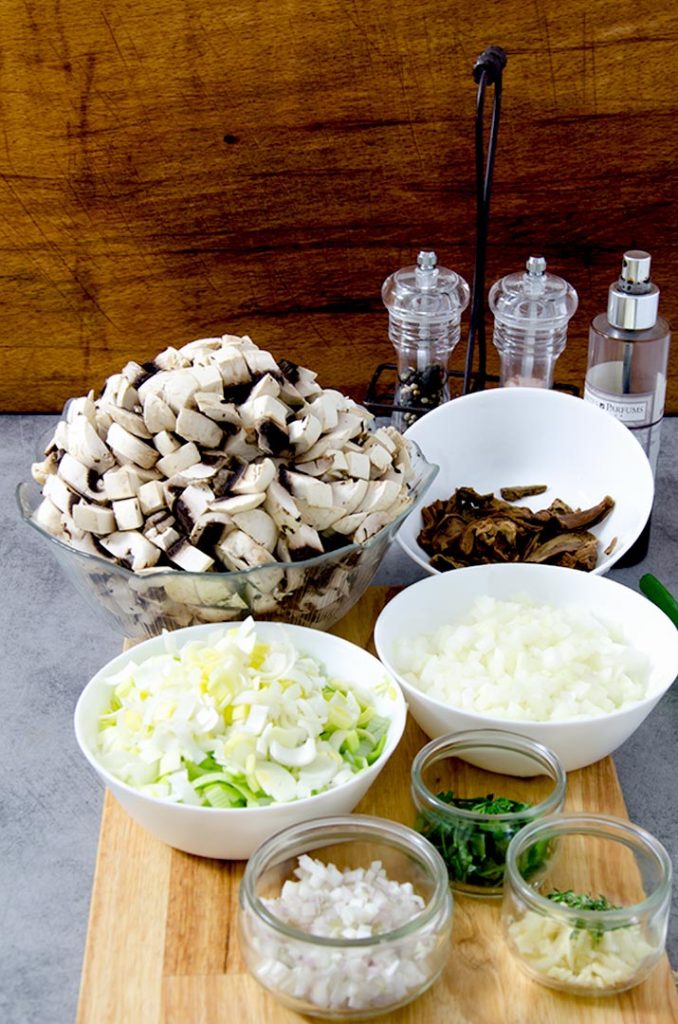 A great cream of mushroom soup starts with fresh ingredients, chopped and ready to go into the soup.