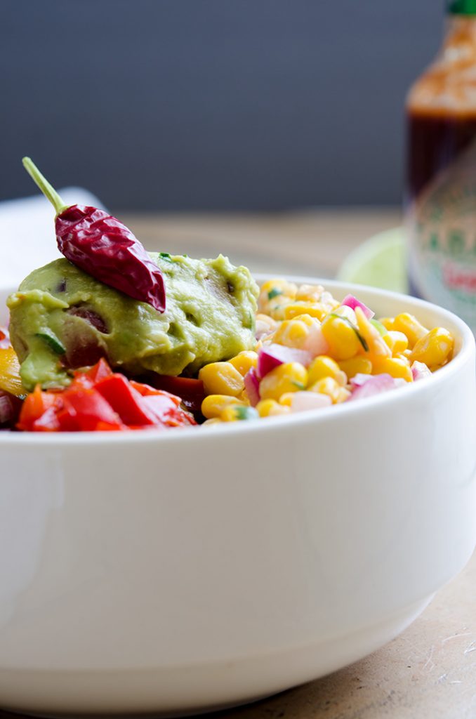 This should be called a Southwestern Salad Vegetarian Power Bowl. So many flavors that all play so well together!