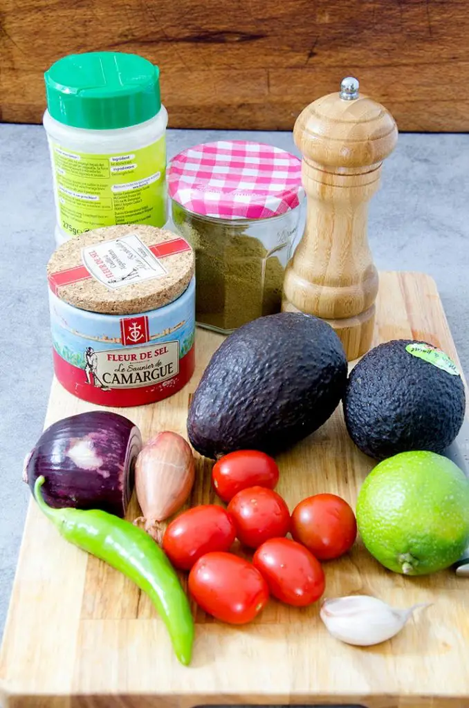 A southwestern salad needs to have fresh guacamole loaded on top.
