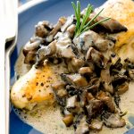 Stuffed chicken breast with creamy mushroom sauce flavored with hints of rosemary and goat cheese. Delicious.