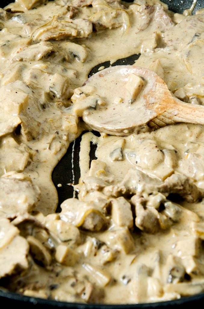 To thicken this beef stroganoff recipe we are going to use an arrowroot slurry, cream and sour cream. It is going to be divine.
