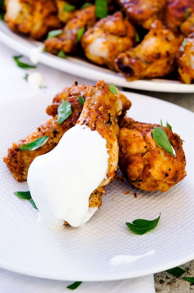 Mmm... I love this hot wing recipe so much. Cool down the heat with blue cheese dressing or my thinned sour cream.