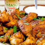 a delicious hot wing recipe with crispy skin that will leave your lips tingling! Delicious and easy recipe.