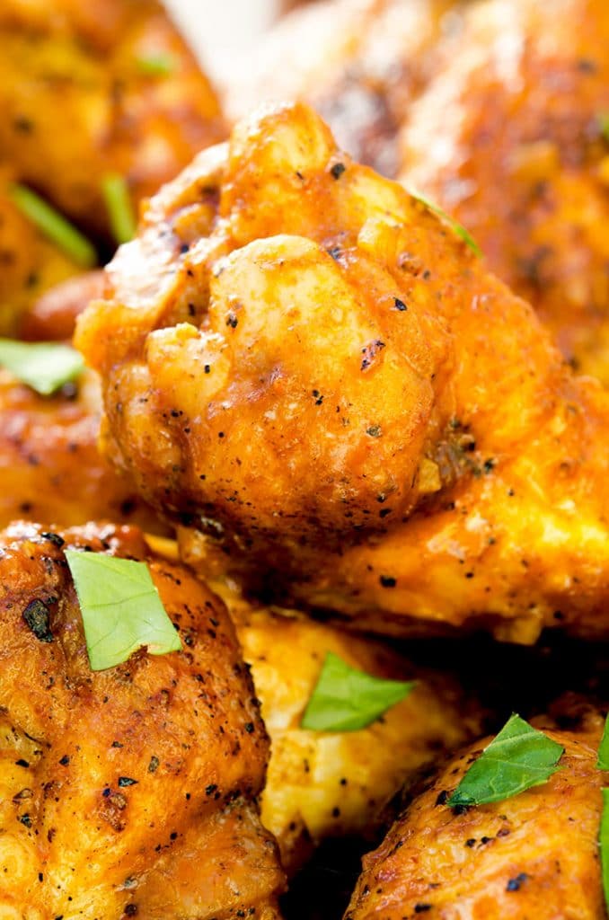 My hot wing recipe has plump, juicy chicken with crispy skin and hot sauce.