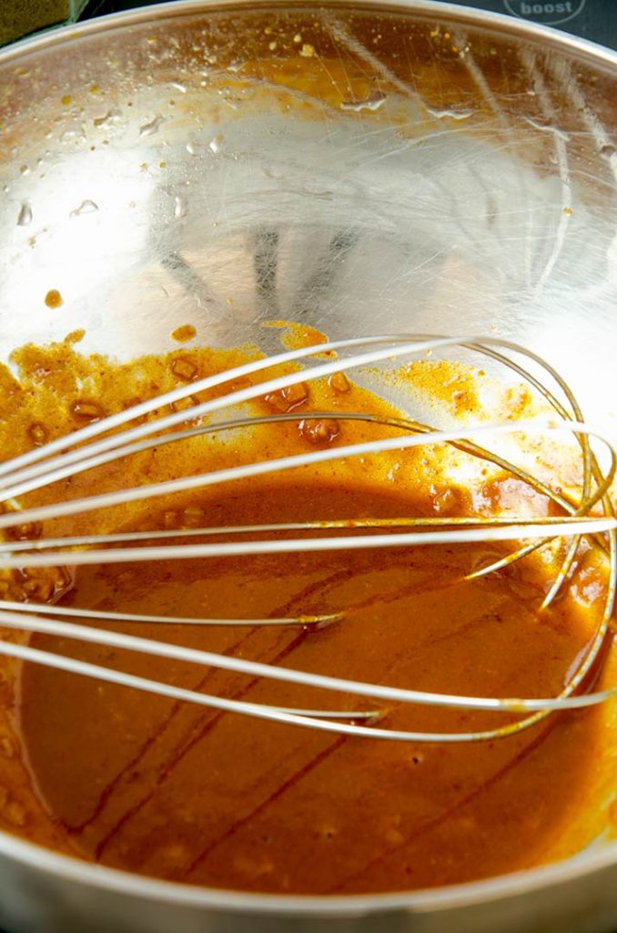 This hot wing recipe starts by making the hot wing sauce... saucy and spicy.