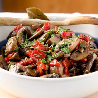 A unique and delightful marinated mushrooms recipe. Pairs perfectly with steak, pork or chicken.