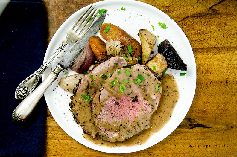 A perfectly easy leg of lamb recipe with herbs, mustard and roasted veggies all in one pot!