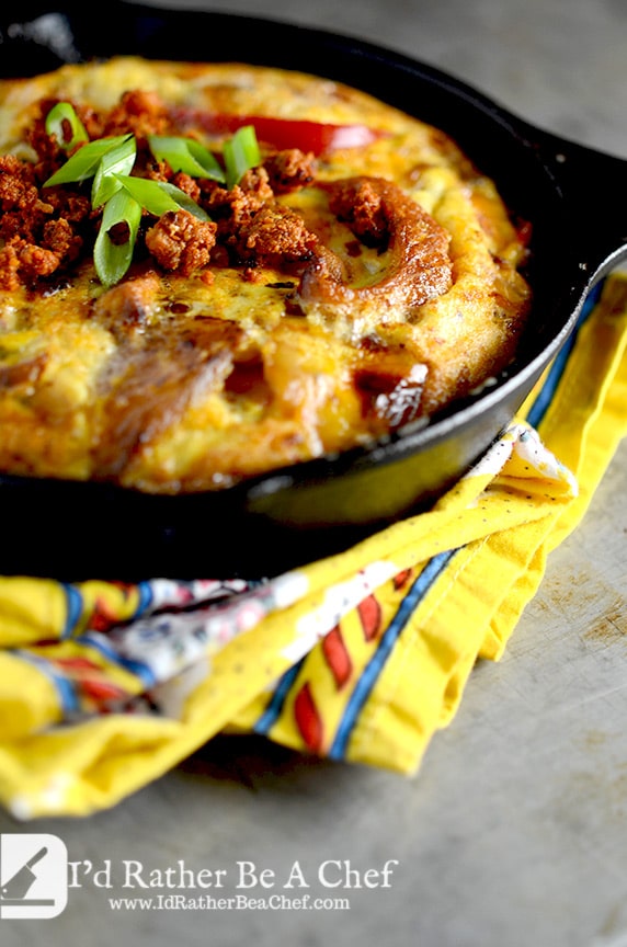 Fajita frittata served in a pan topped and with scallions
