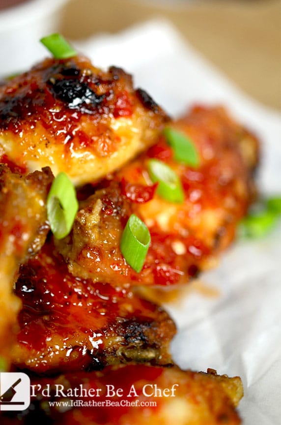 Thai sweet chili wings topped with scallions