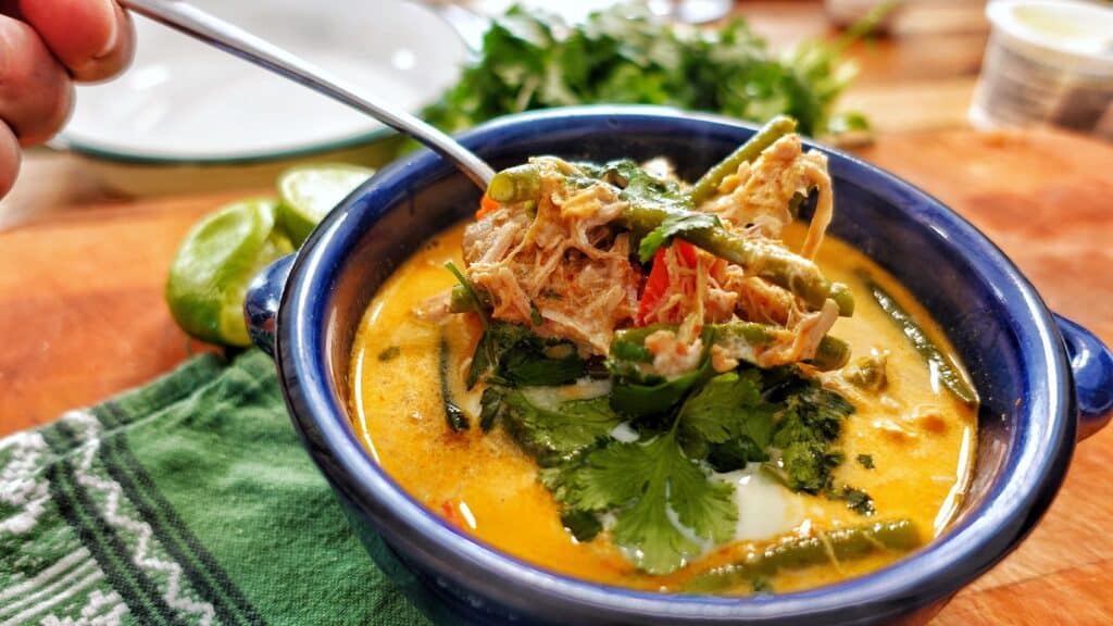 Image of a keto thai red curry soup recipe in a bowl