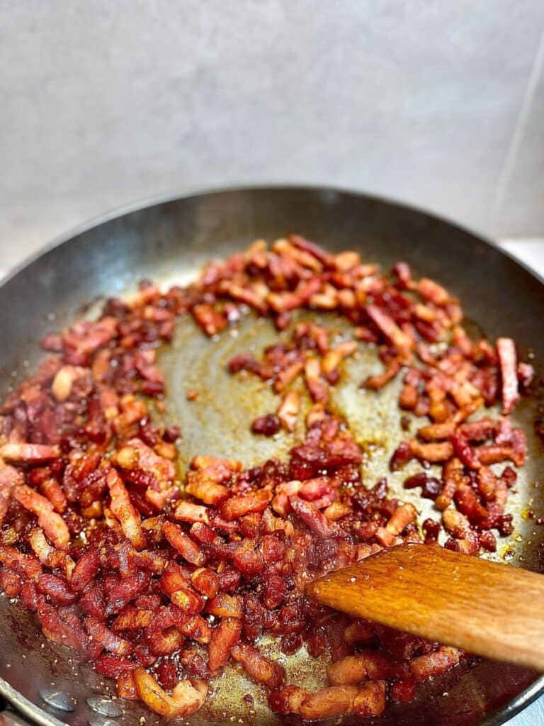 Spices and seasonings being mixed into homemade bacon bits