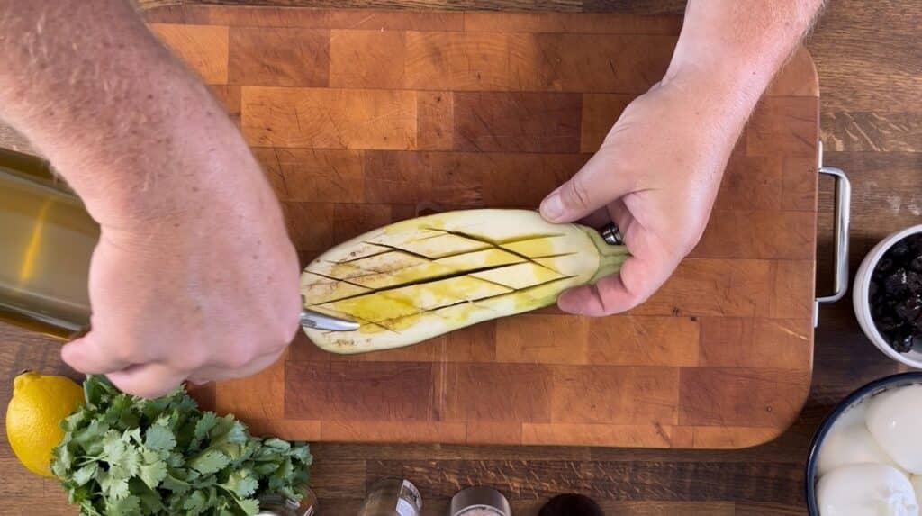 Drizzle olive oil into the eggplant