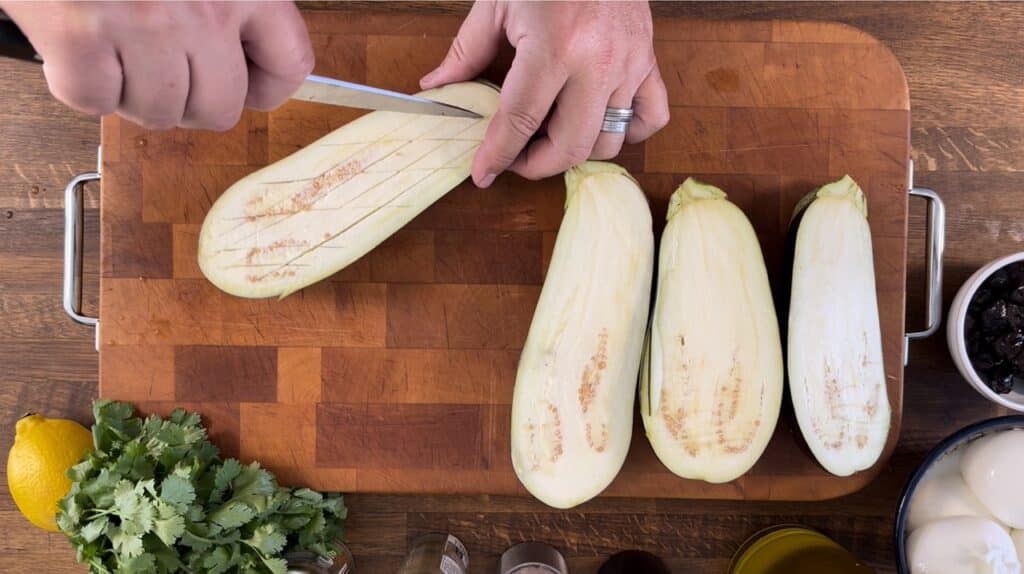 Scoring eggplant with a knife