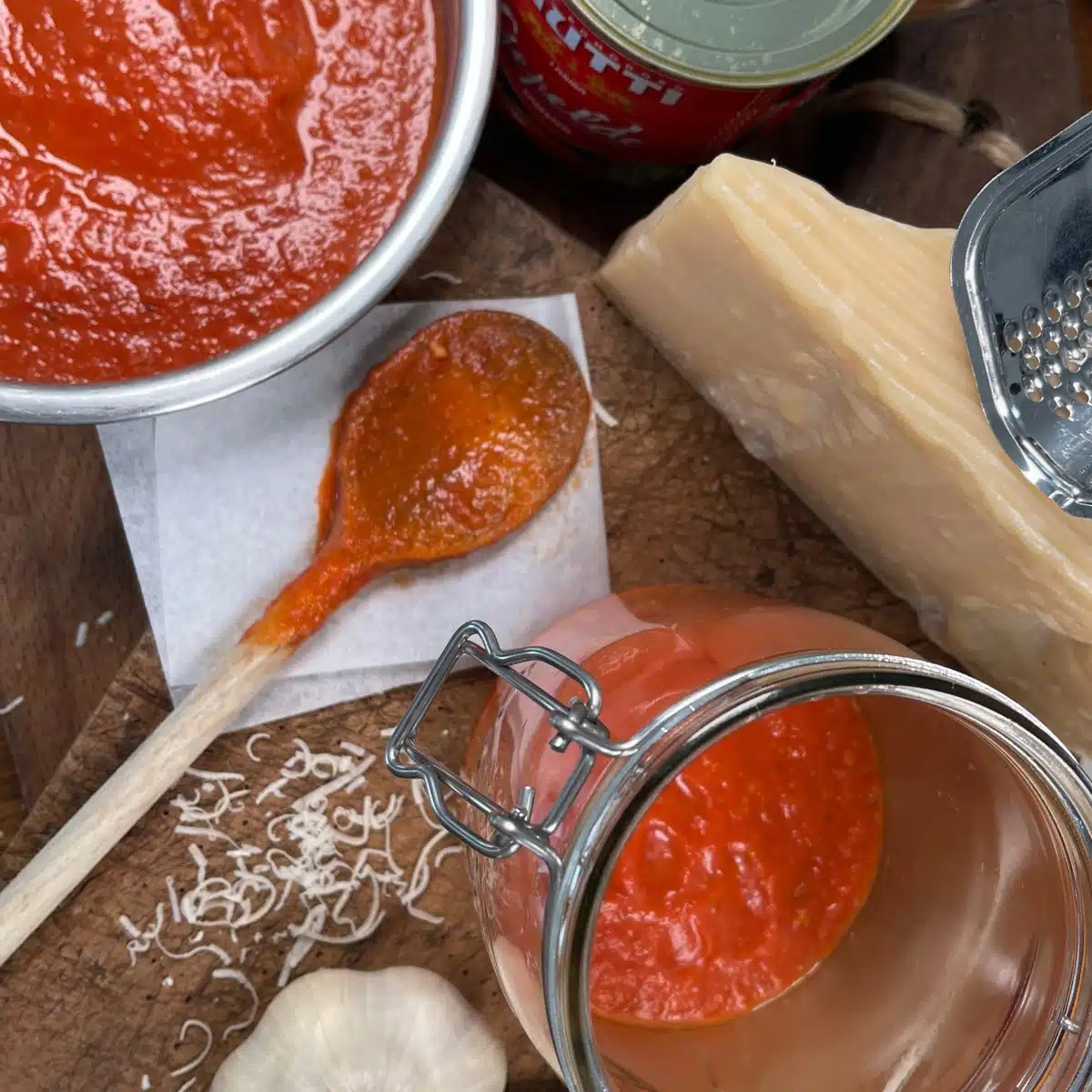 Spoonful of homemade tomato sauce on a counter