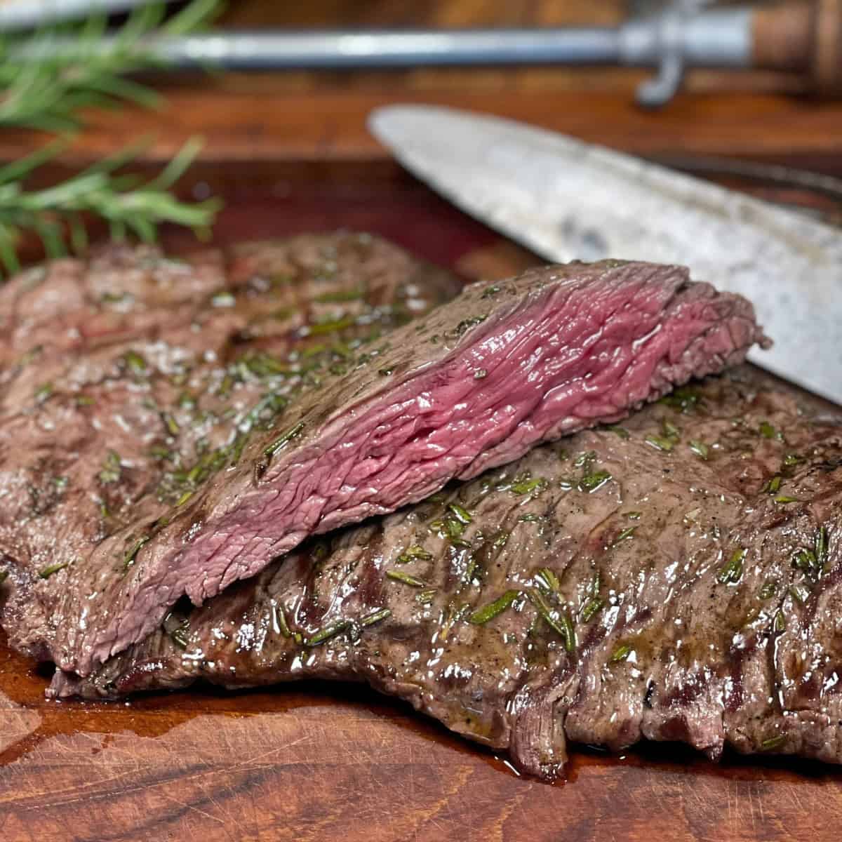 Keto steak marinade served with fresh herbs featured image