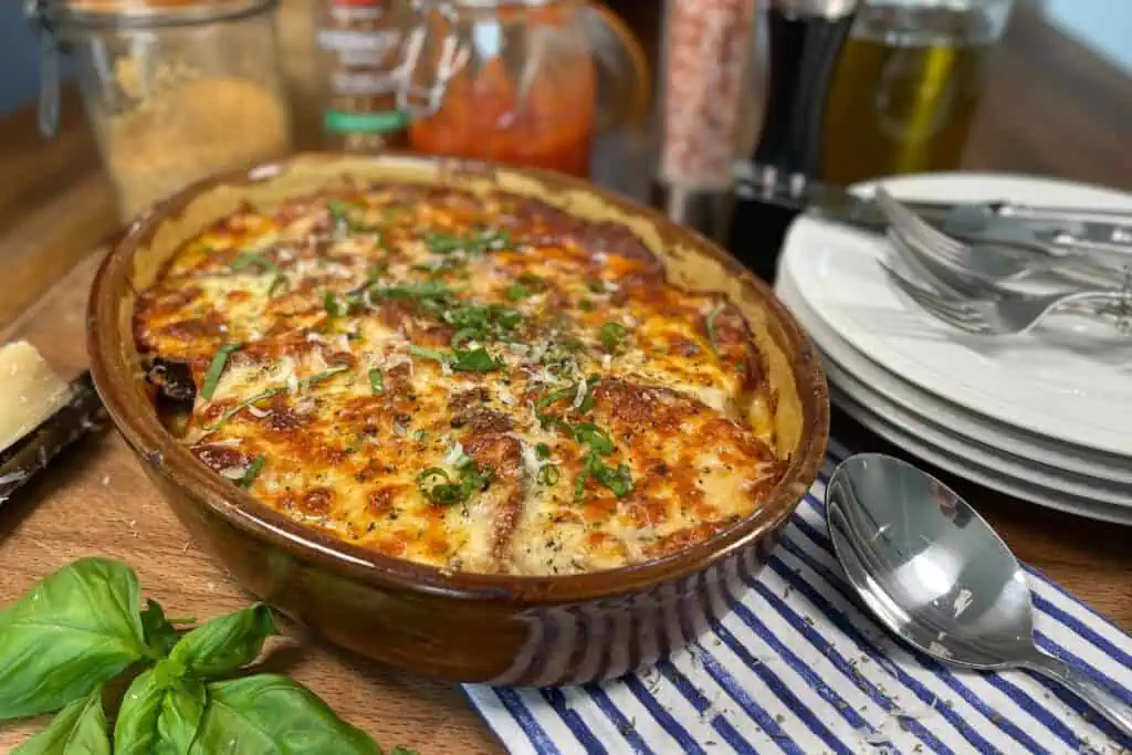 Keto eggplant Parmesan served in an antique baking dish