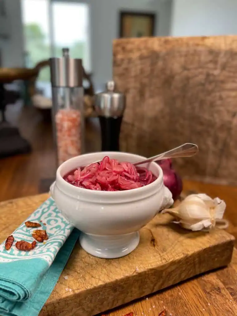 Pickled red onions in a fancy dish