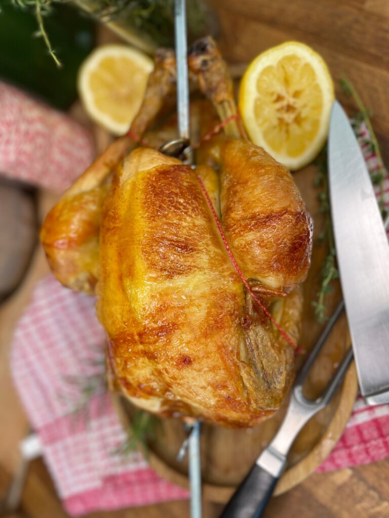 Rotisserie chicken on a cutting board 2