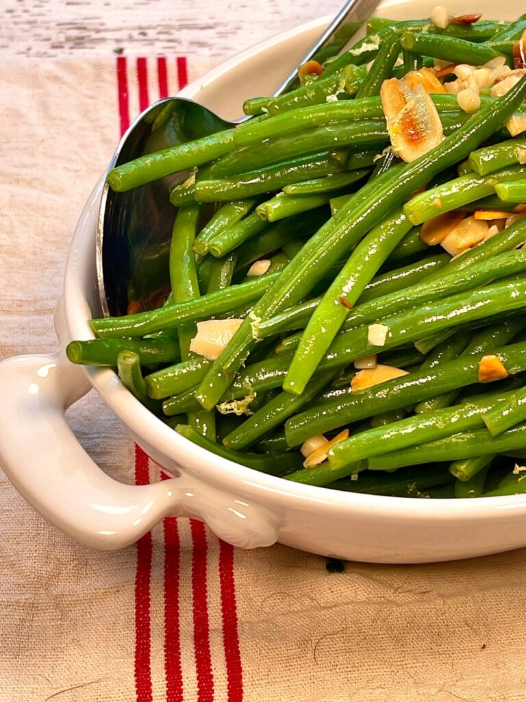 Close up of keto French haricot verts in a baking dish