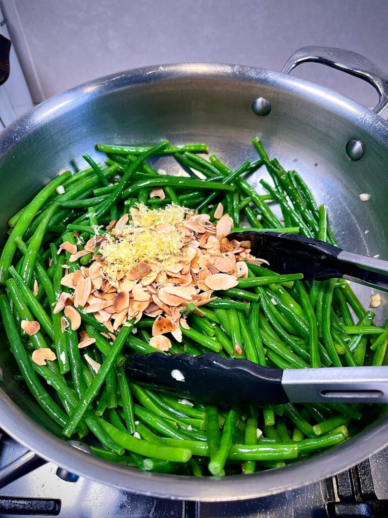 All ingredients being added to the pan to make haricots vert
