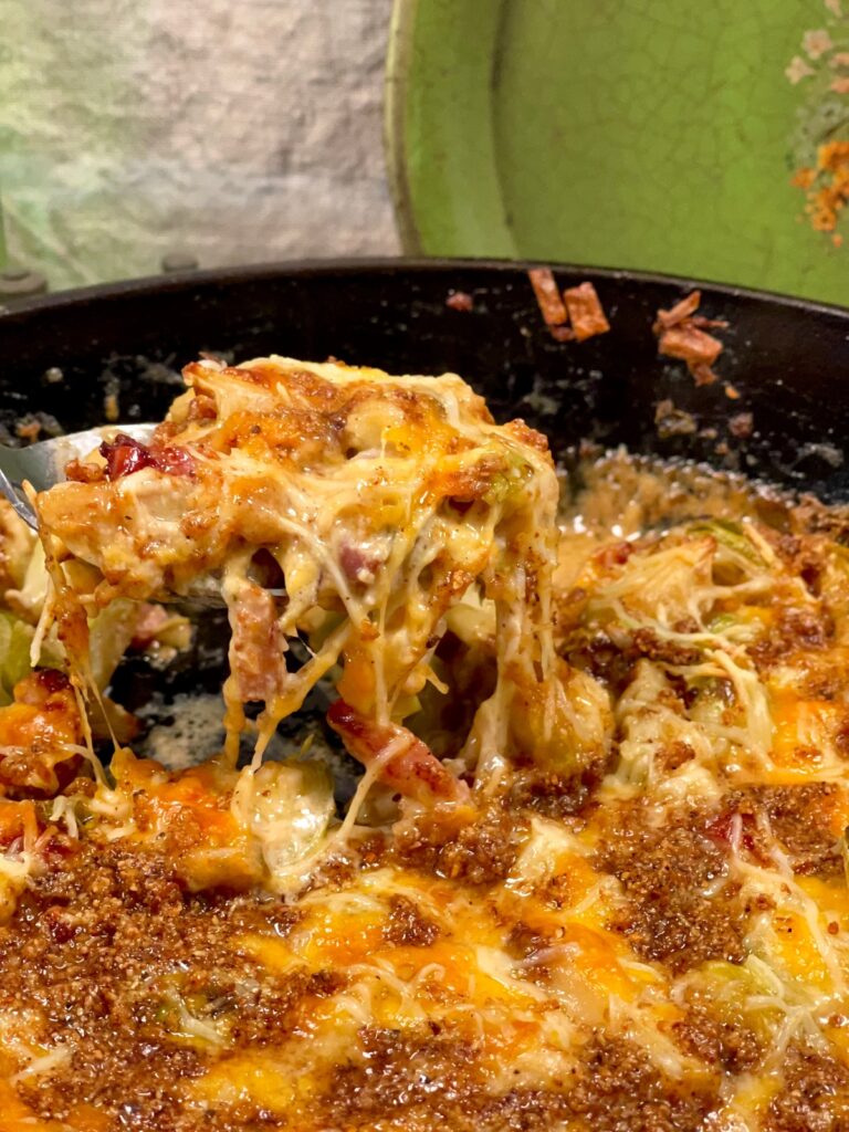 Spoonful of cheesy brussel sprout casserole